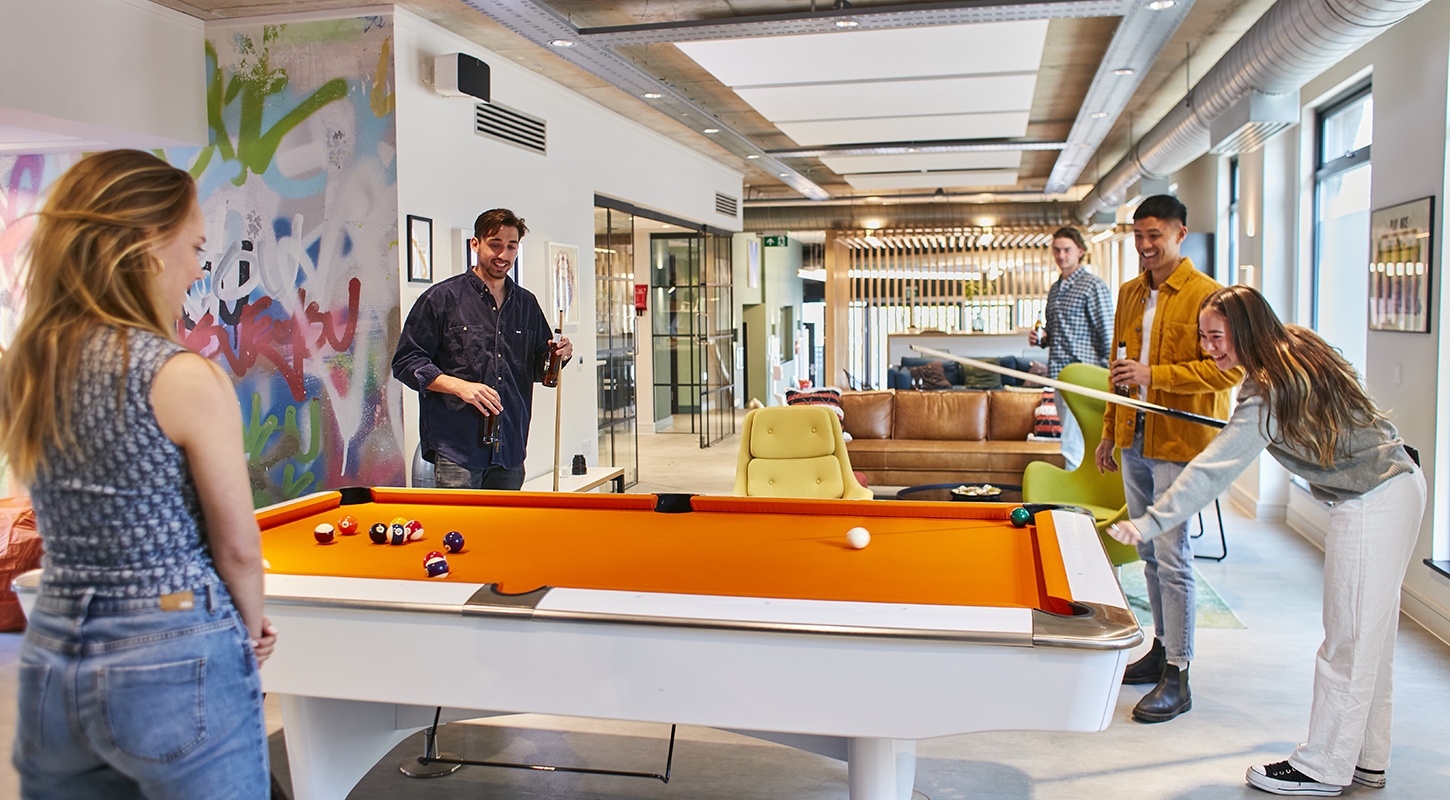 students playing pool at exeter student accommodation