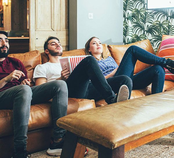 Students relaxing in communal student accommodation area