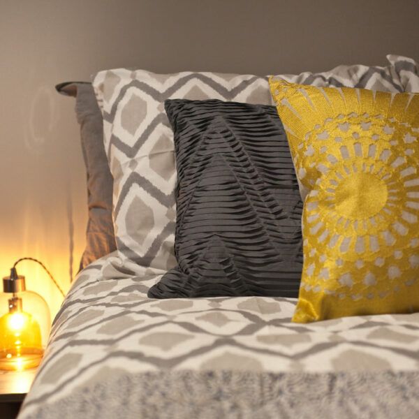 bed with 3 pillows