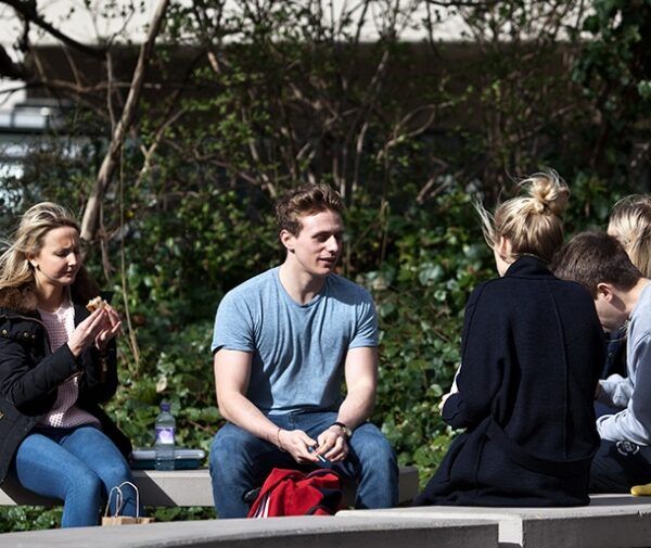 Students chatting with each other outdoors