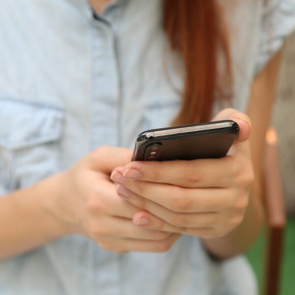 student using phone