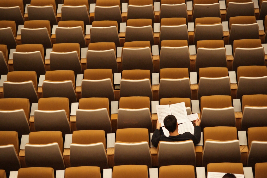 a student sitting in the classroom lecture hall