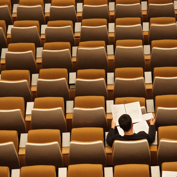 a student sitting in the classroom lecture hall