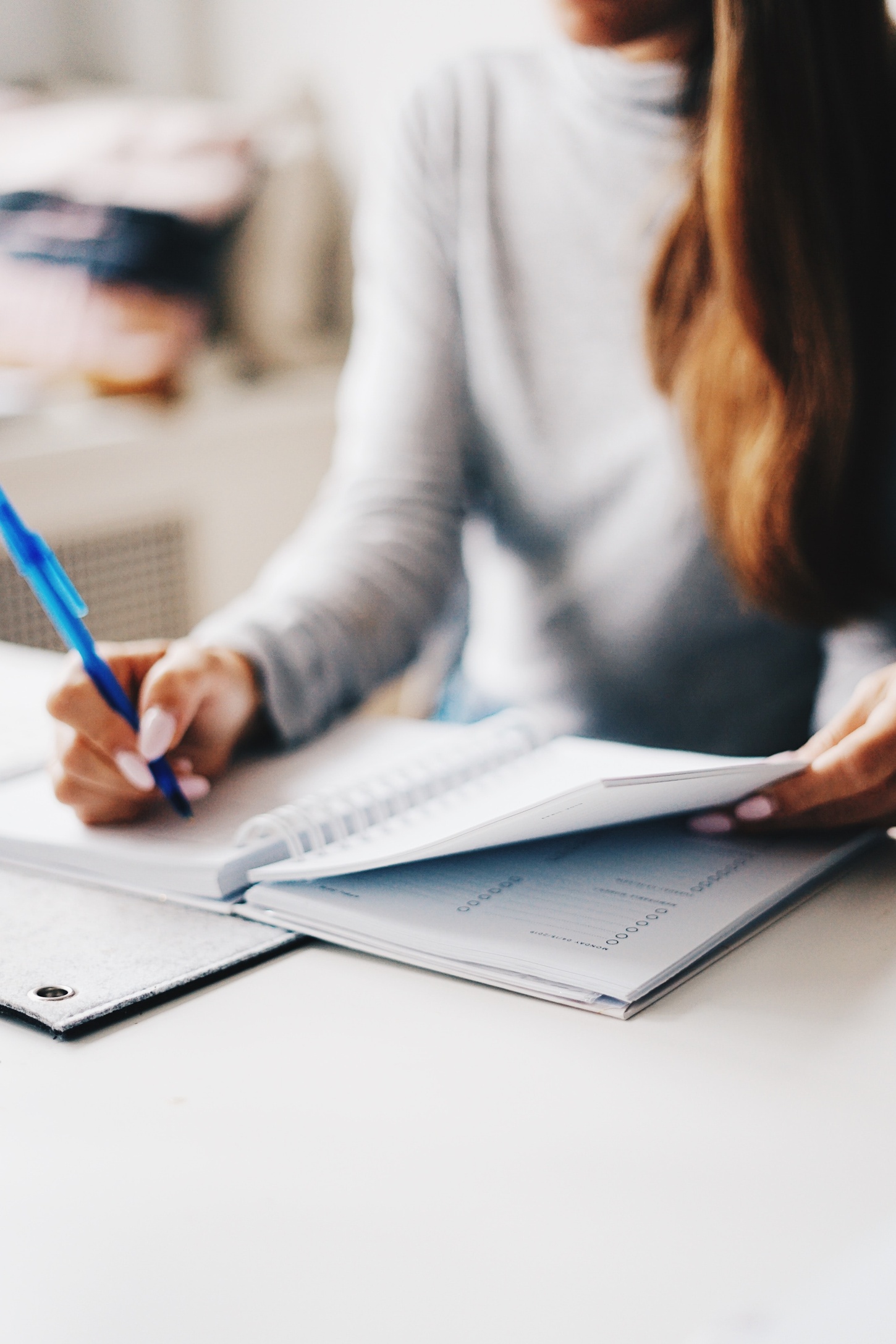 student taking notes