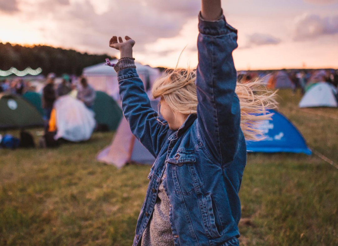 person dancing at festival reading