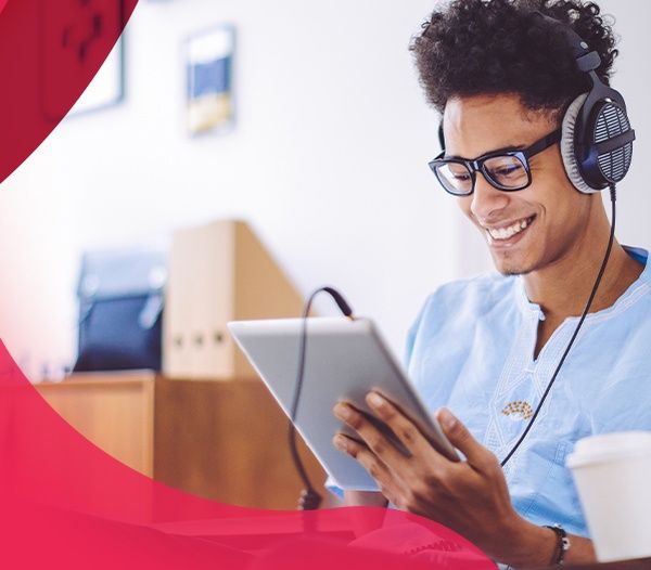 students wearing headphones happy