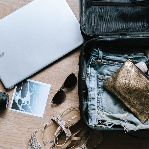 The suitcase can hold a laptop, camera, sunglasses, shoes, clothes, cosmetics