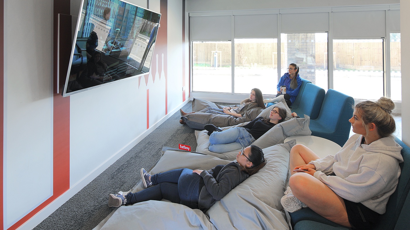 students watch tv in student accommodation winchester