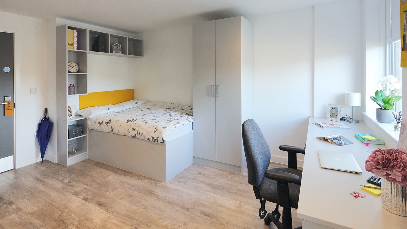 bed and desk in student accommodation winchester