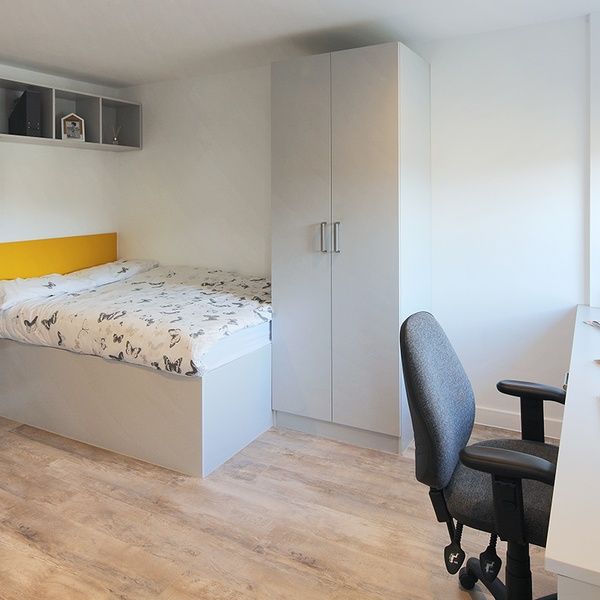 bed and desk in student accommodation winchester