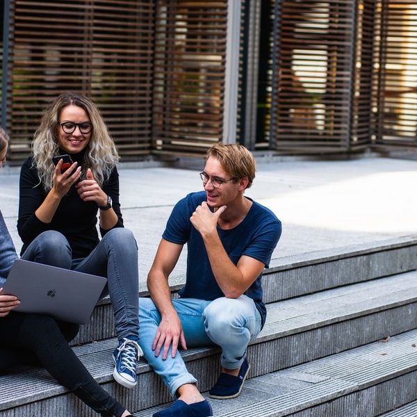 students sitting on steps