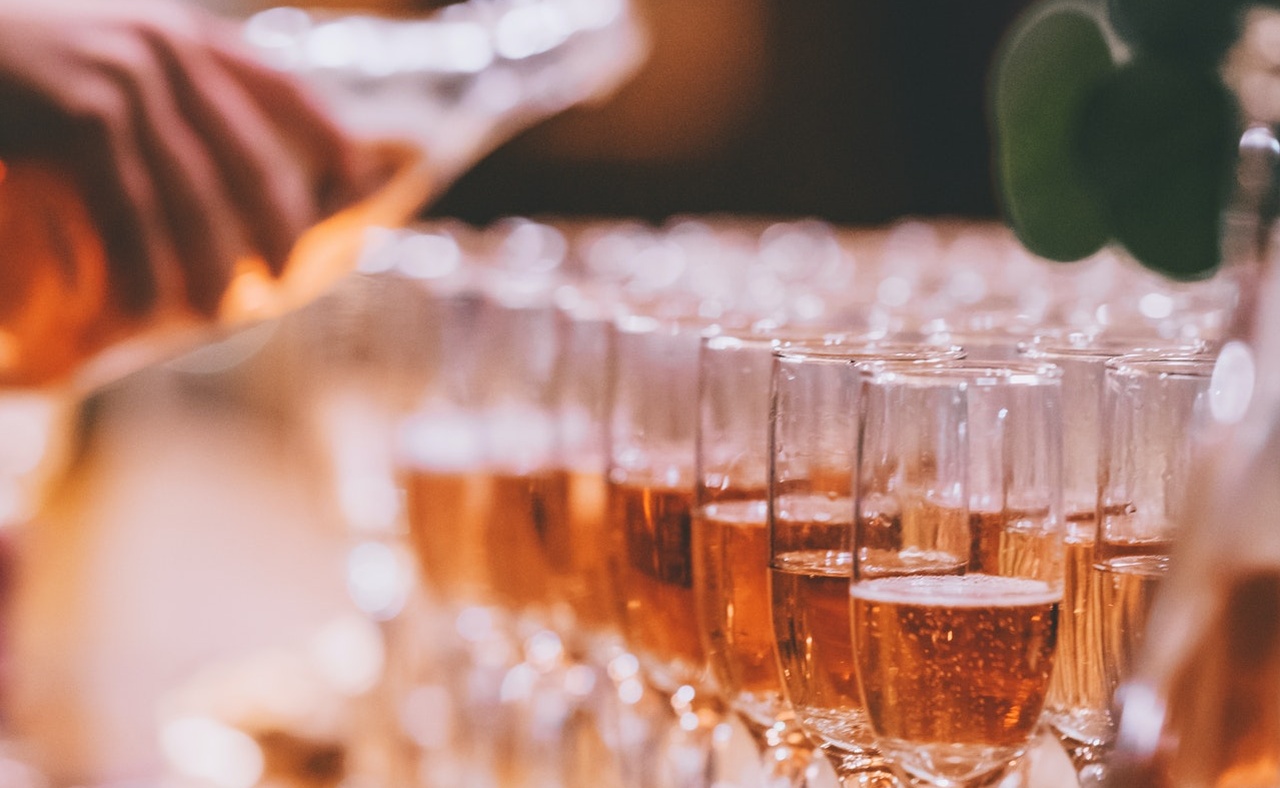 glasses of prosecco being poured
