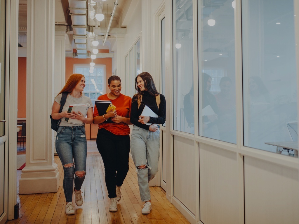 students in university hallway