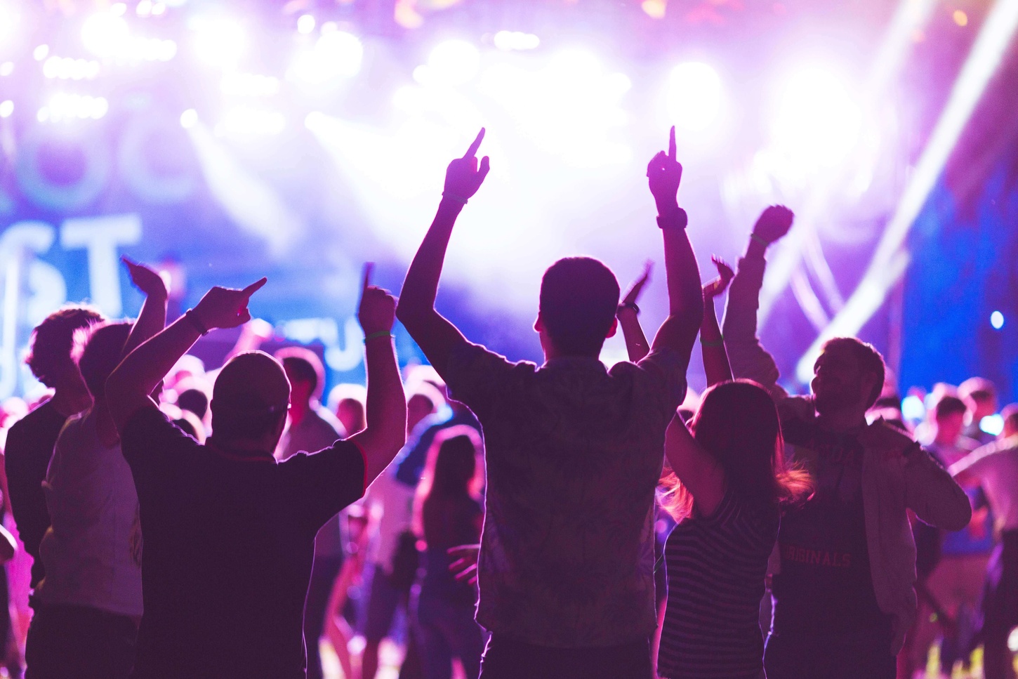 A group of students dancing in a nightclub