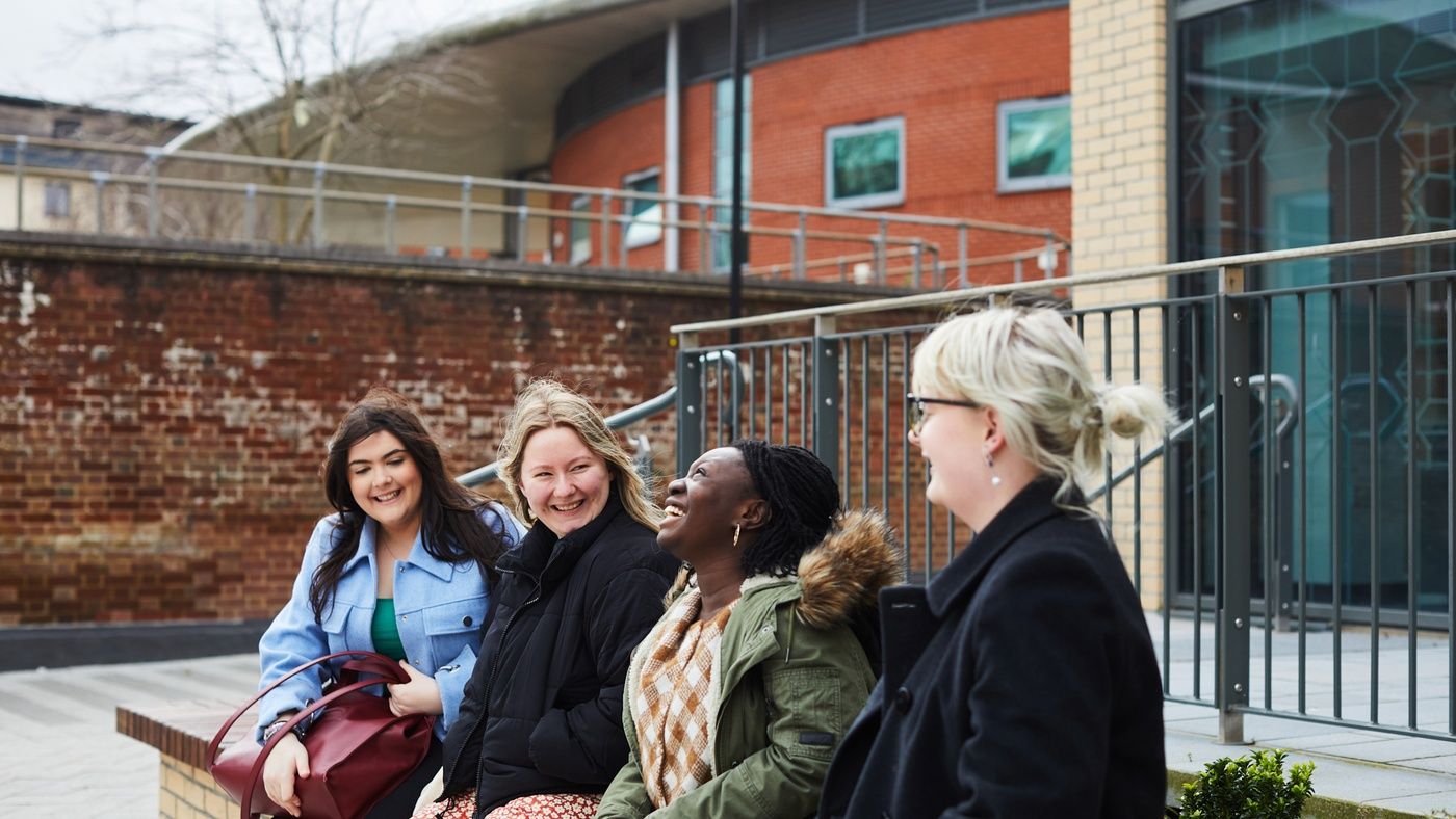 CP Norwich outside laughing