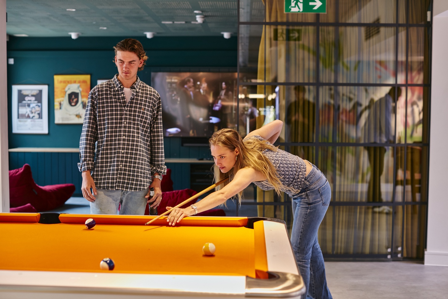 students playing pool in student accommodation