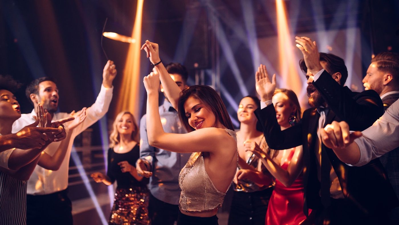 students dancing on dancefloor