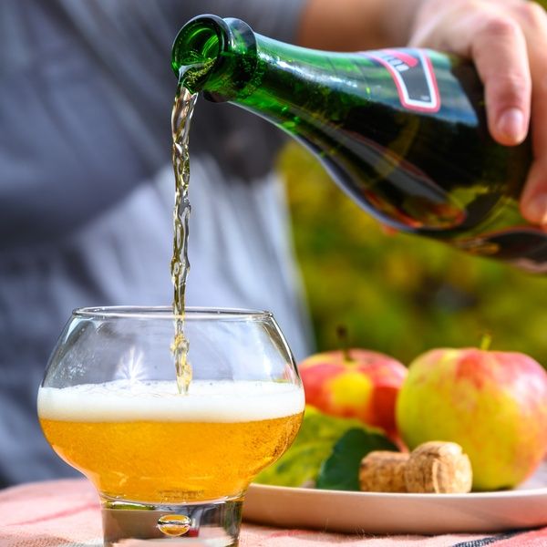 cider being poured in garden
