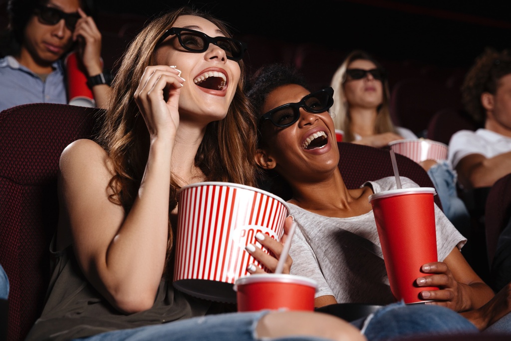 students laughing in cinema