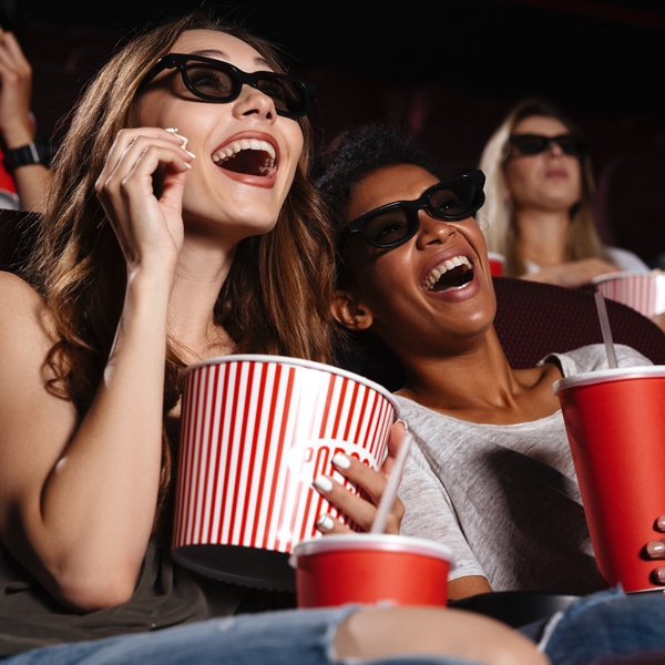 students laughing in cinema