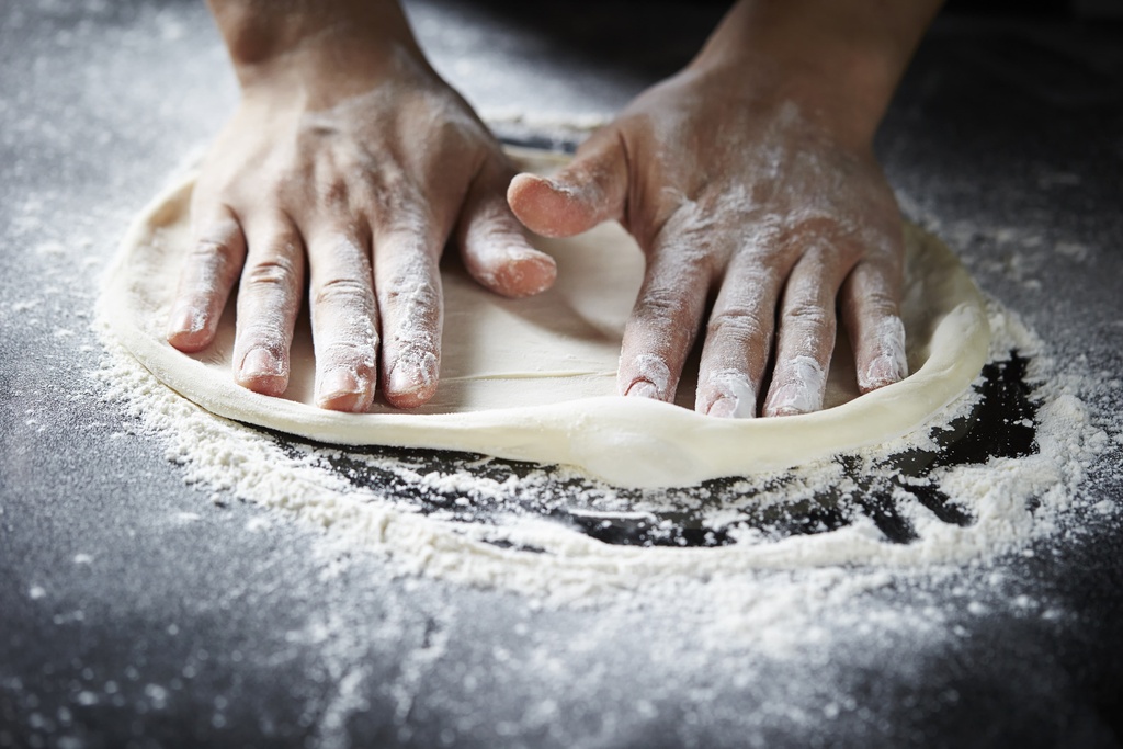 pizza dough being needed