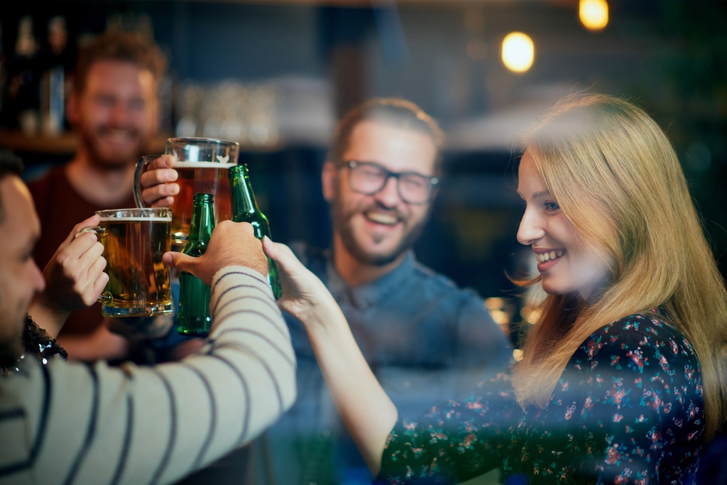 students cheers in student bar