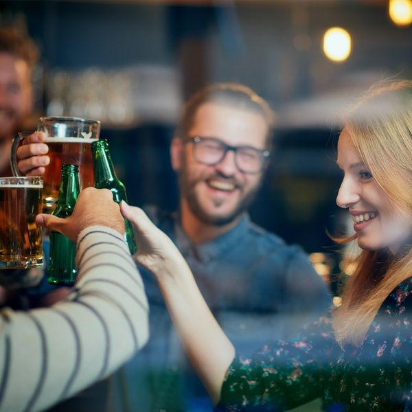 students cheers in student bar