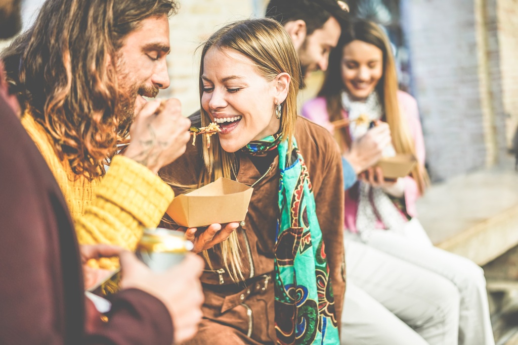 students eating street food
