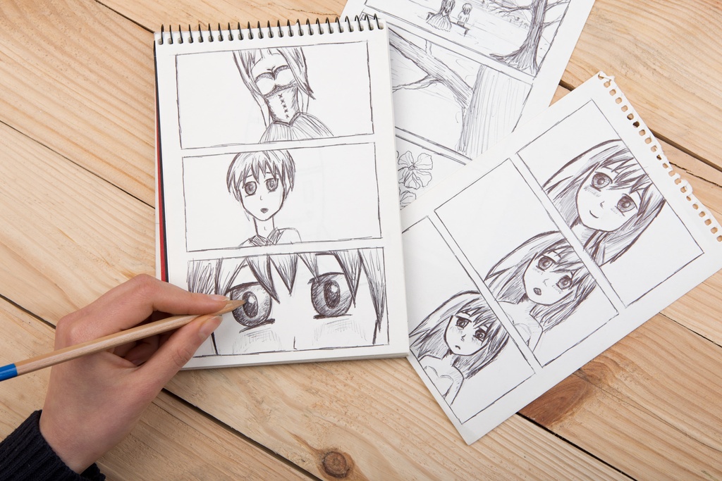 student manga drawing in class