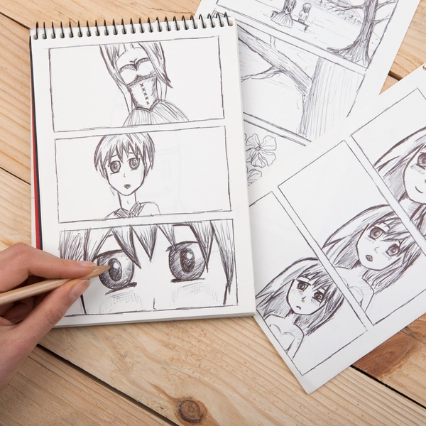 student manga drawing in class