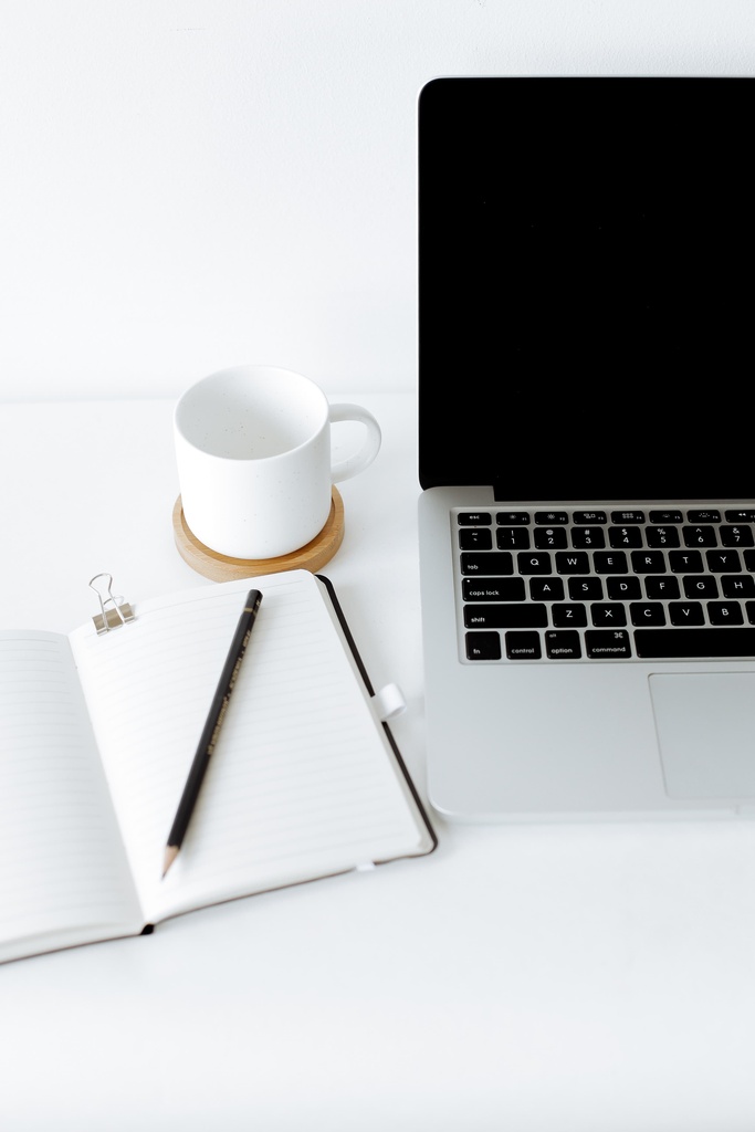 student laptop, notebook and coffee cup