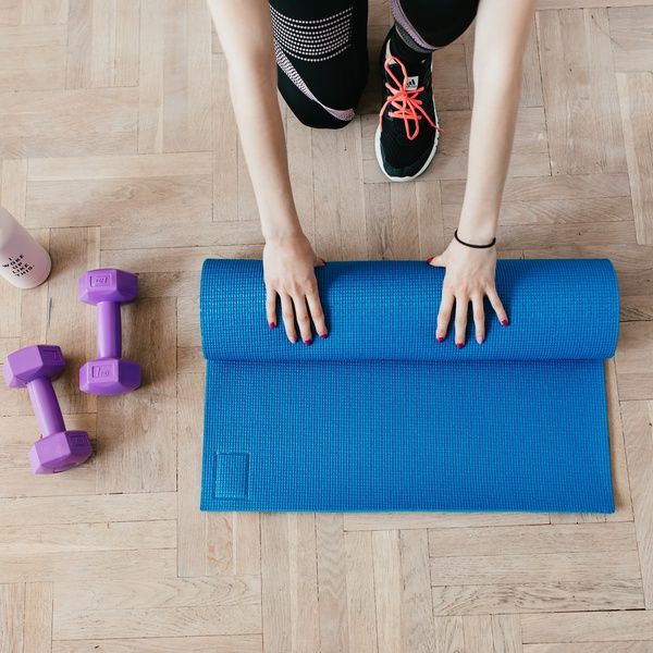 student with gym equipment