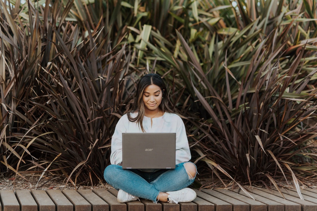 student studying on laptop