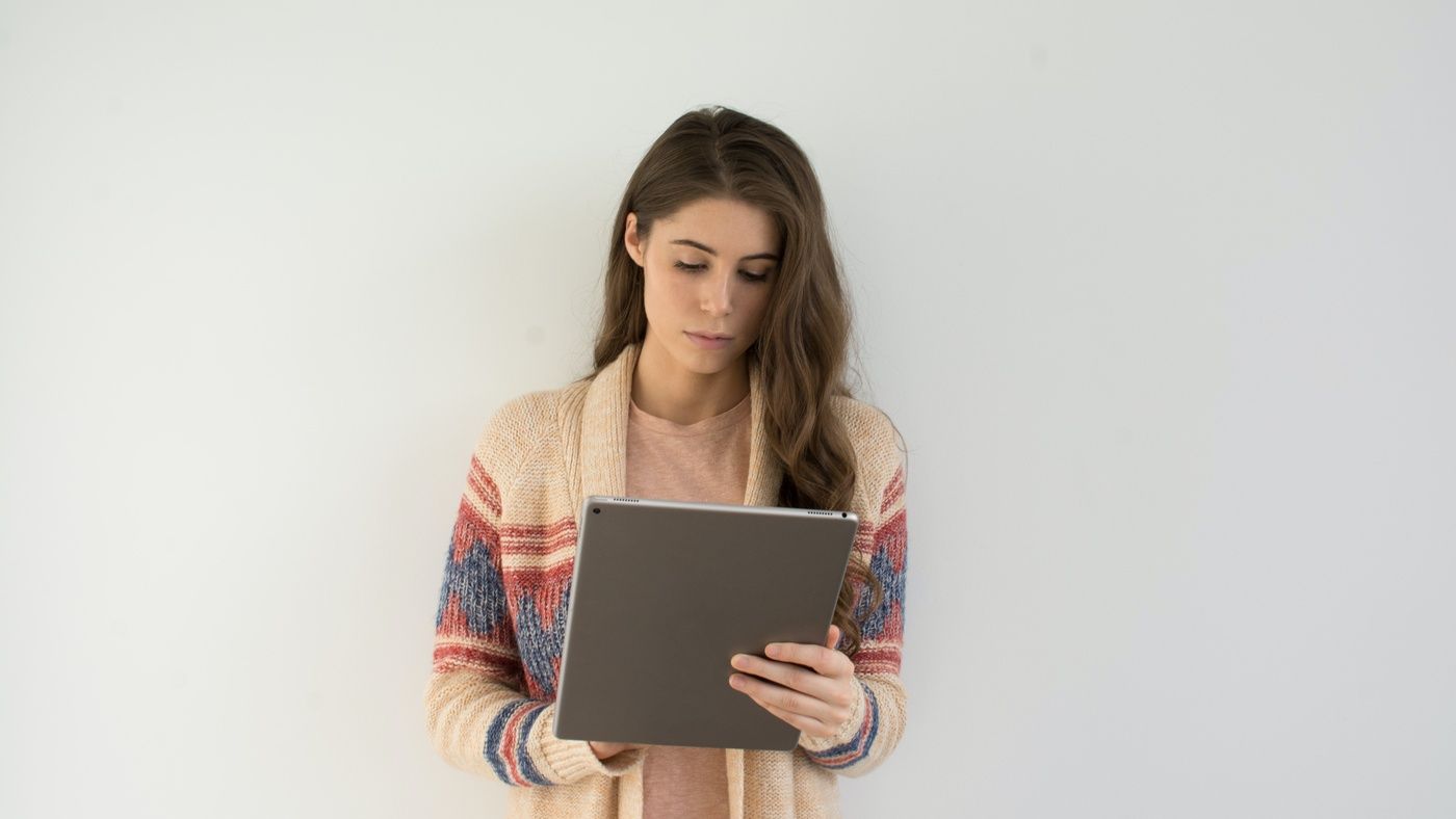 student looking at tablet
