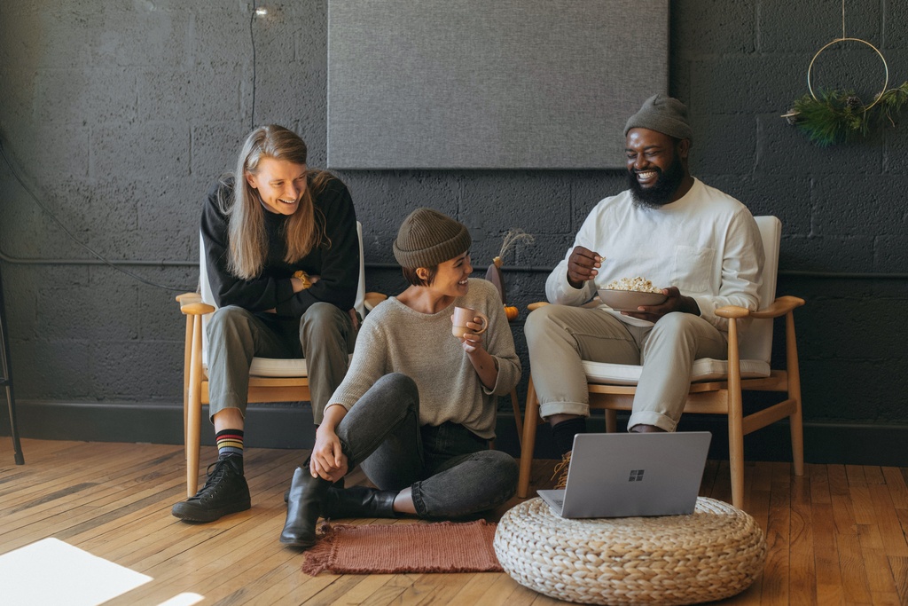 students laughing in living room