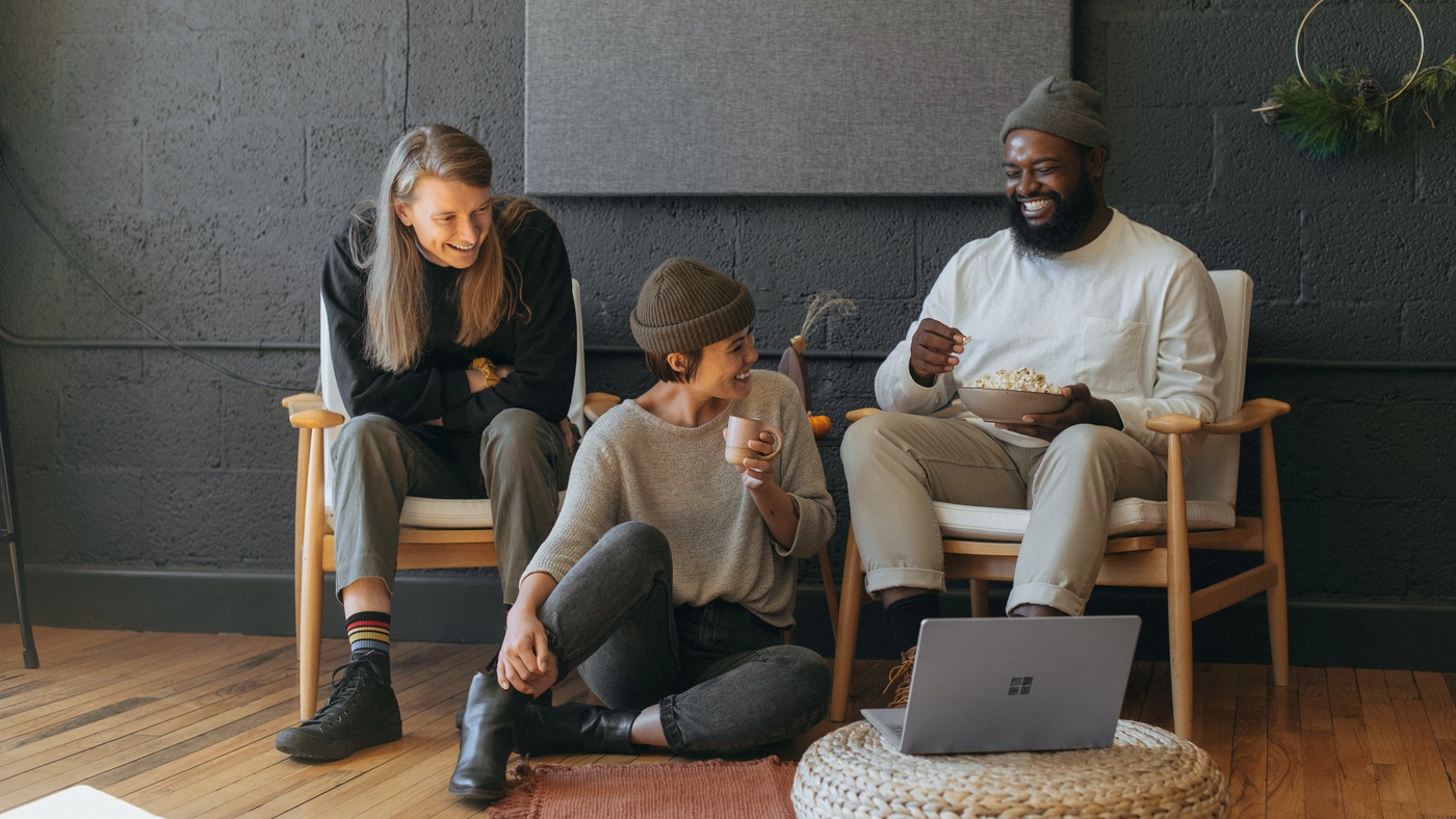 students laughing in living room